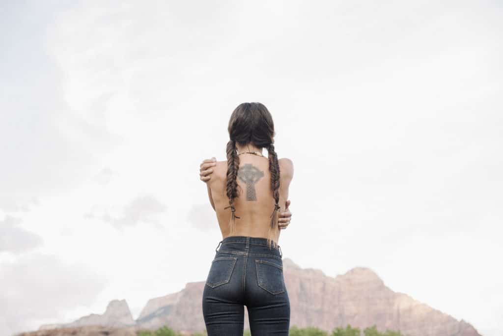 cross tattoo on back