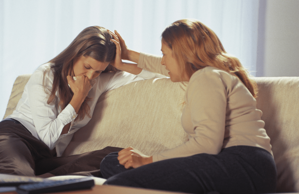 friends talking sadly