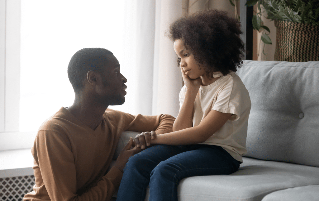 girl talking to dad