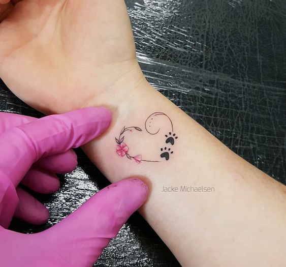 paw print heart design tattoo 