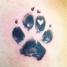 paw print with a heart tattoo 