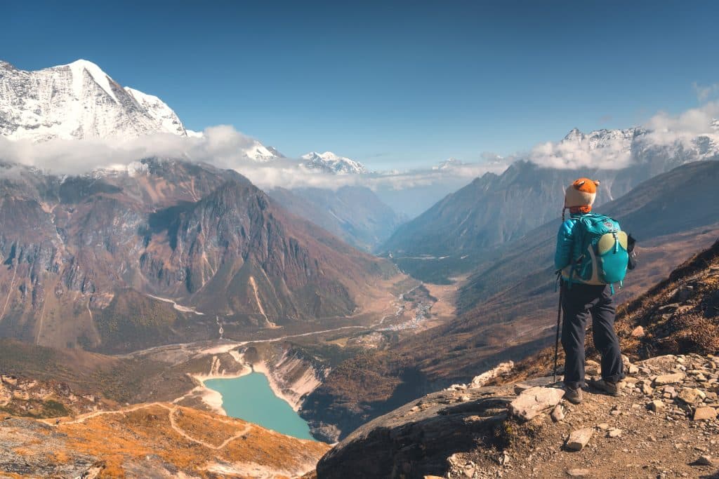 standing at a mountain