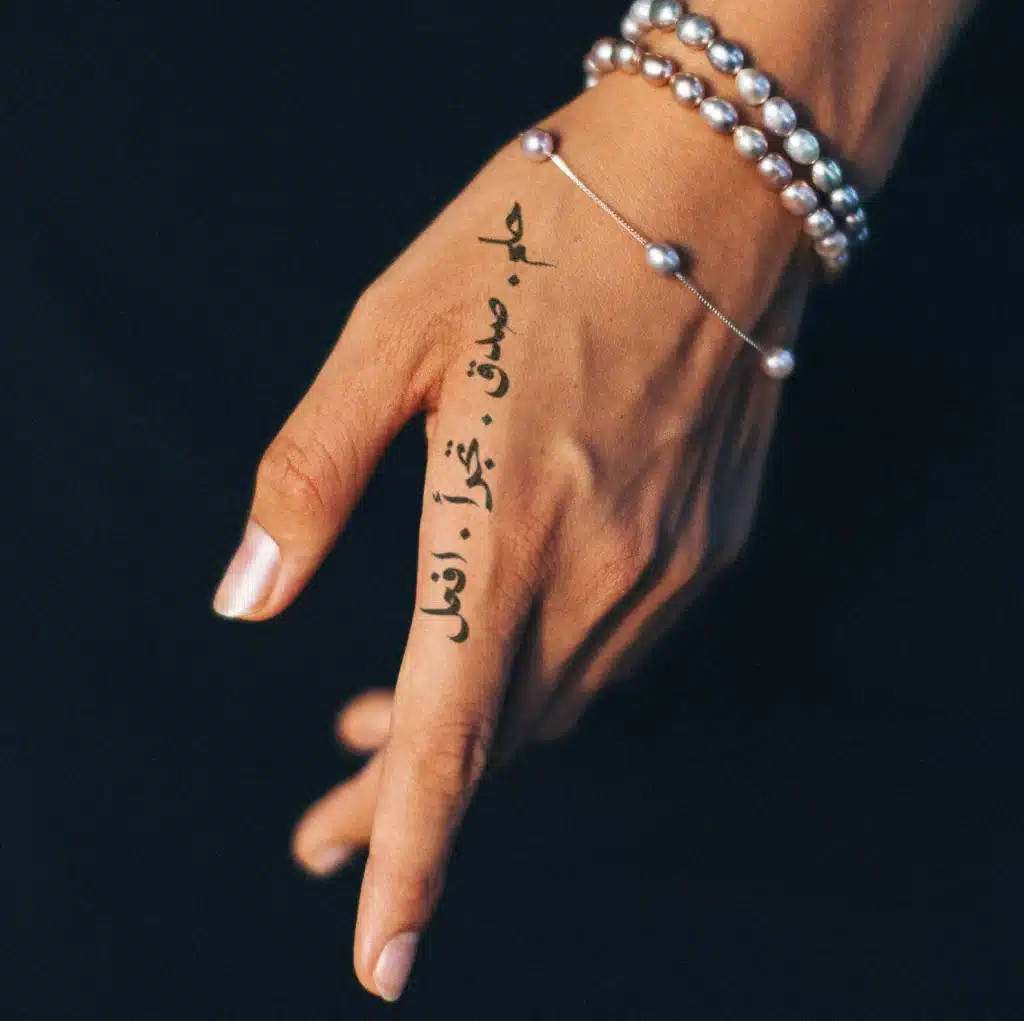 dream believe dare do arabic tattoo