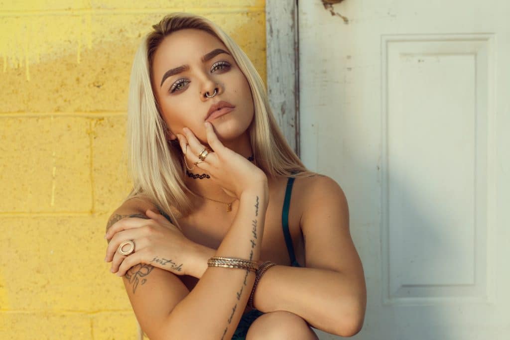 arm writing tattoo