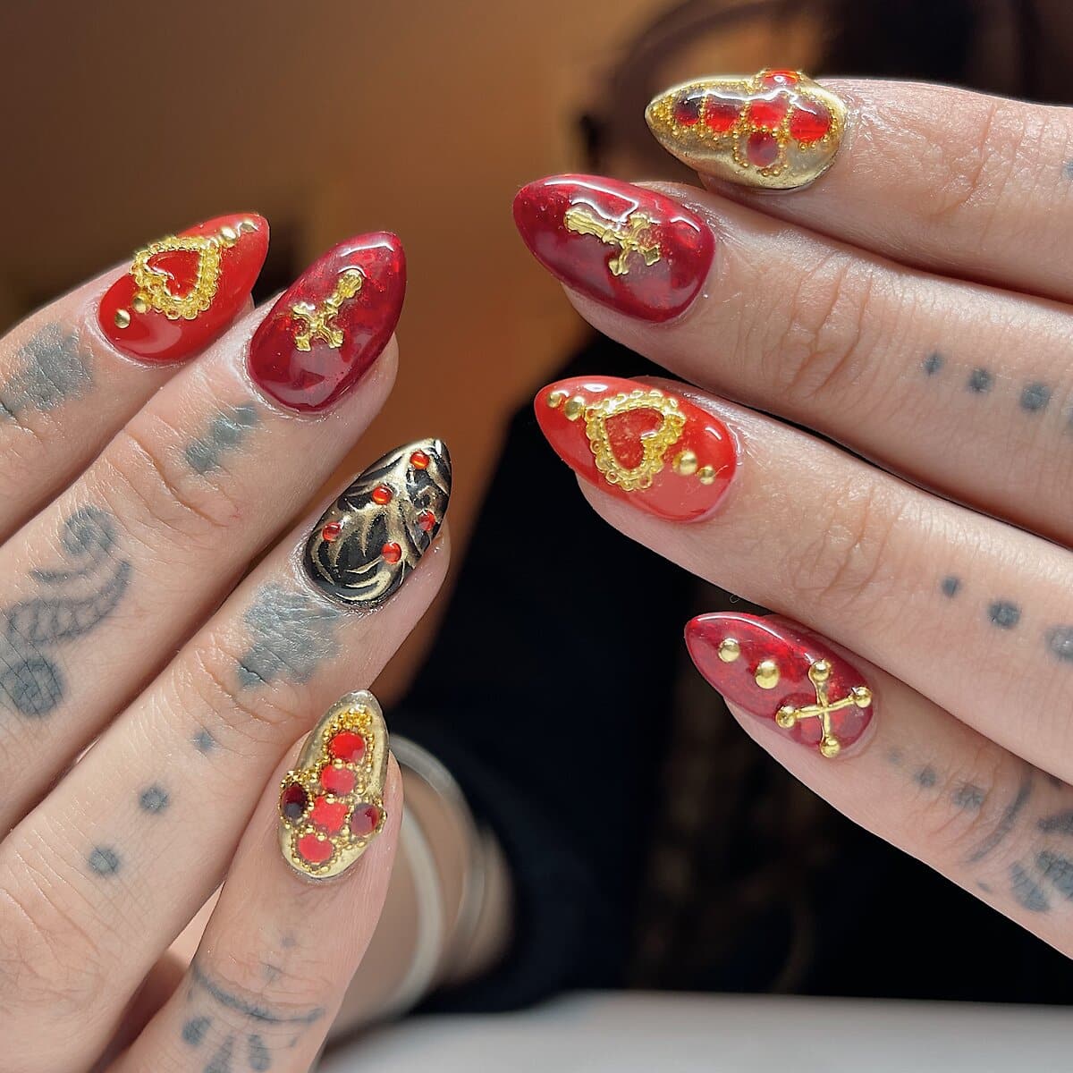 3d nail design for valentines day hearts with red gold and black