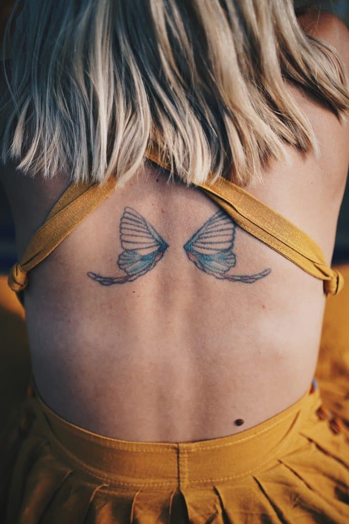 color ink angel wings tattoo
