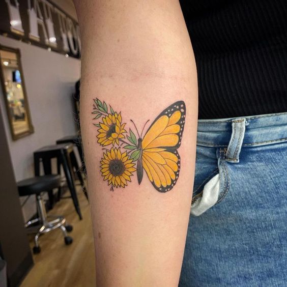 yellow sunflower butterfly tattoo