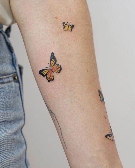 yellow butterflies tattoo