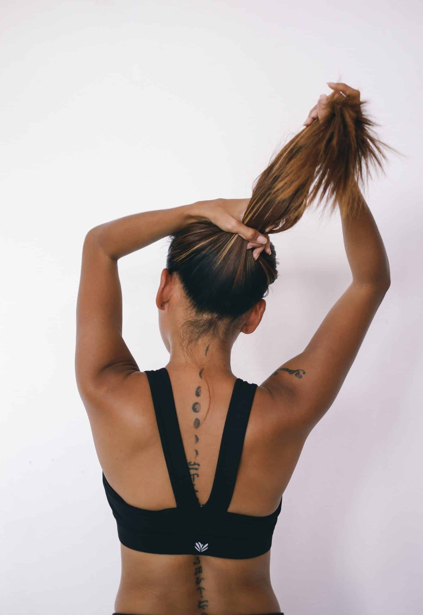phases of the moon back tattoo on the spine