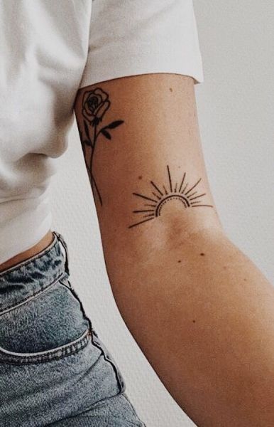 minimalist sun tattoo for women