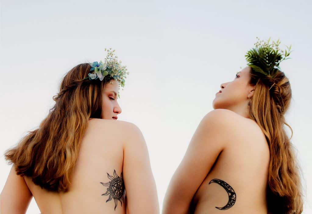 sun and moon matching tattoos for sisters