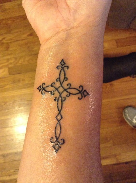 feminine celtic cross tattoo design