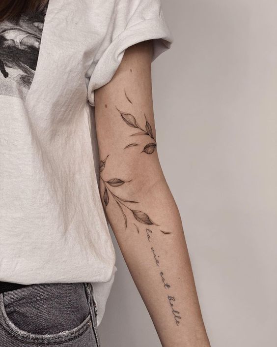 olive branch tattoo with the words la vie set belle