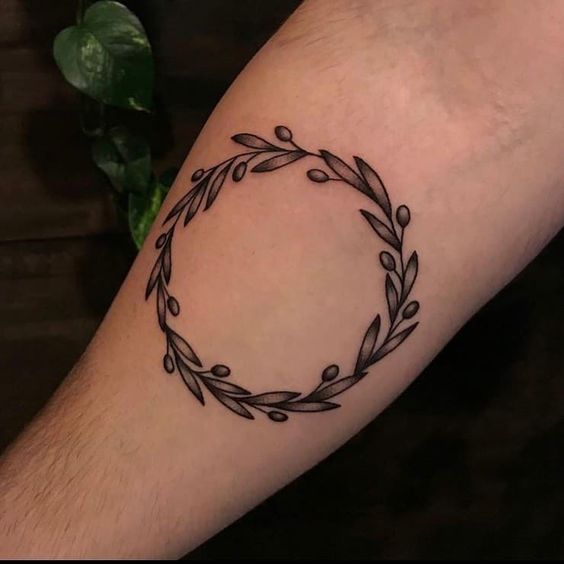 full circle olive wreath olive branch tattoo design