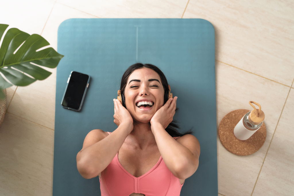 listening to yoga playlist during yoga session
