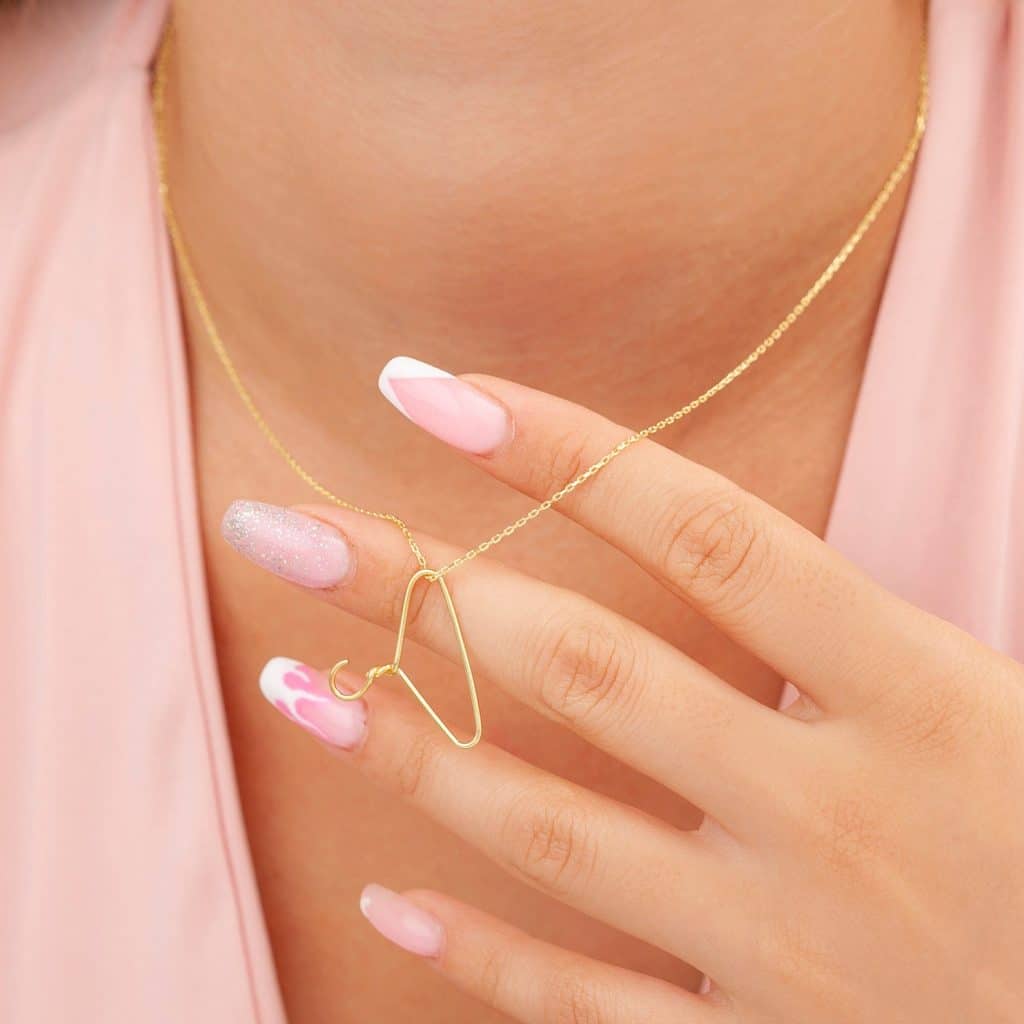 clothes hanger feminist necklace pendant