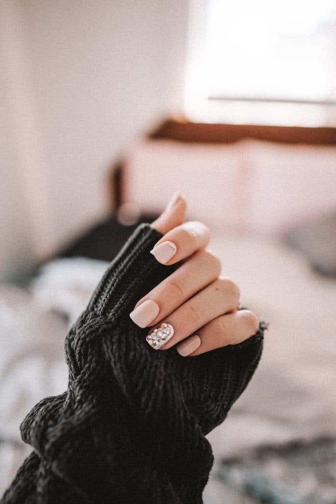 subtle white nails with diamonte