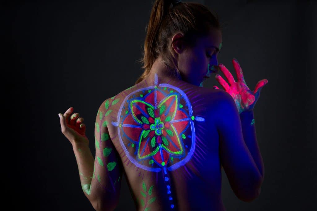 neon body paint designs for girls neon mandala on back