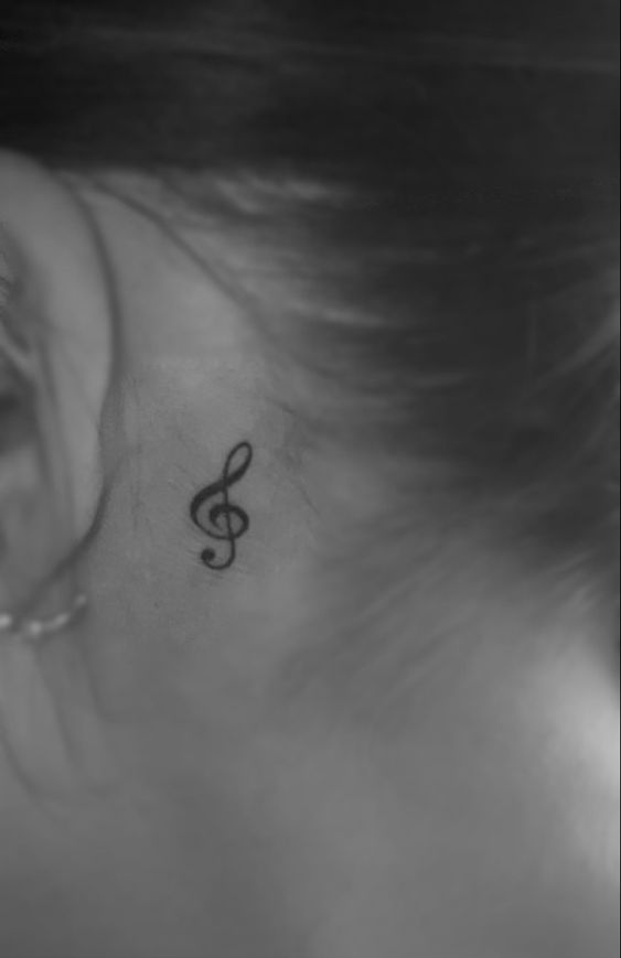 music note tattoo behind ear 