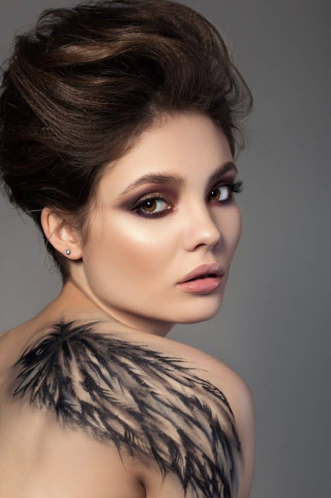 angel wings tattoo on shoulder 