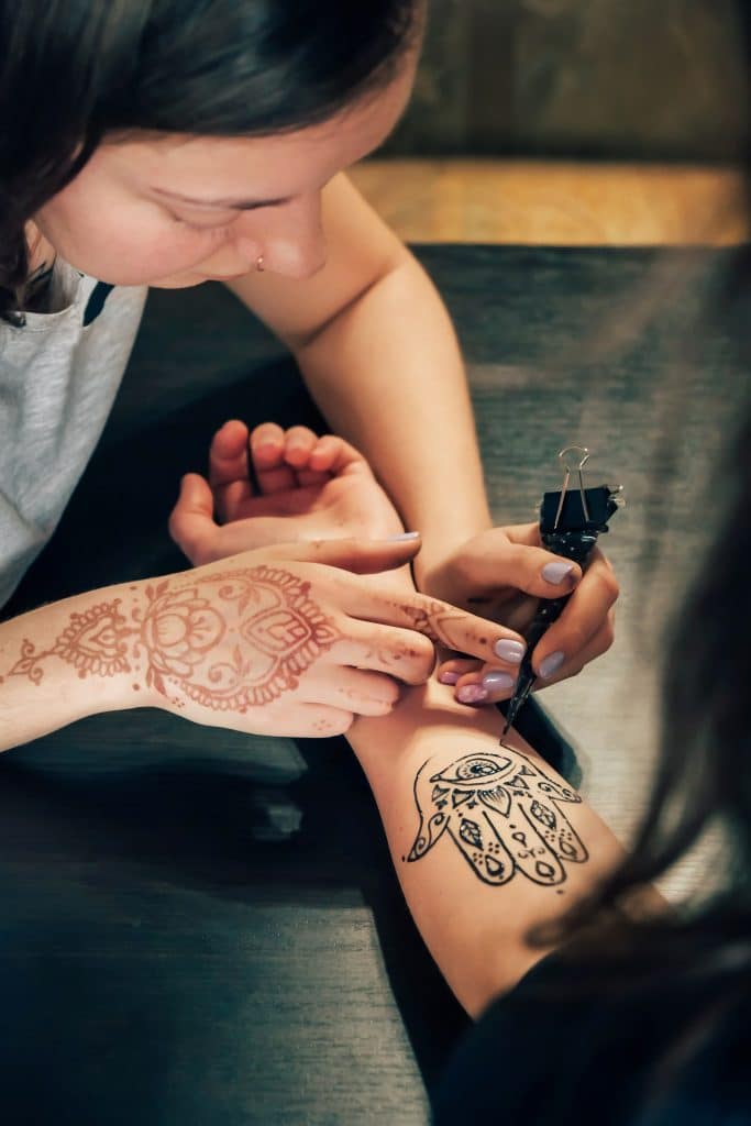 evil eye hamsa hand henna tattoo