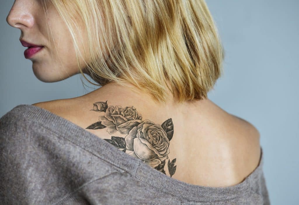 rose tattoo on back