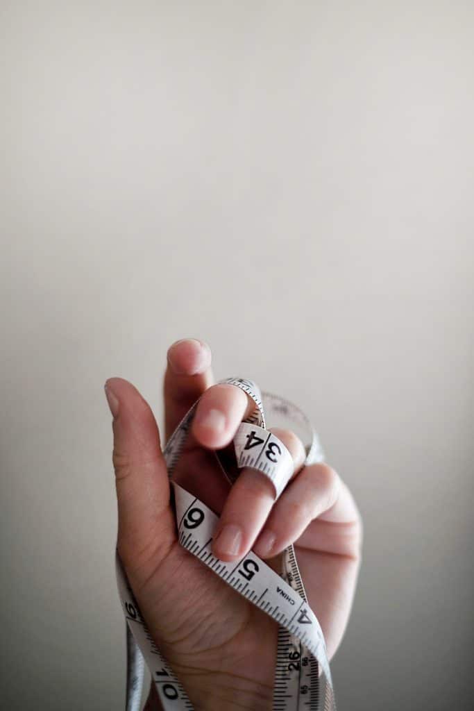 tape measure in hands