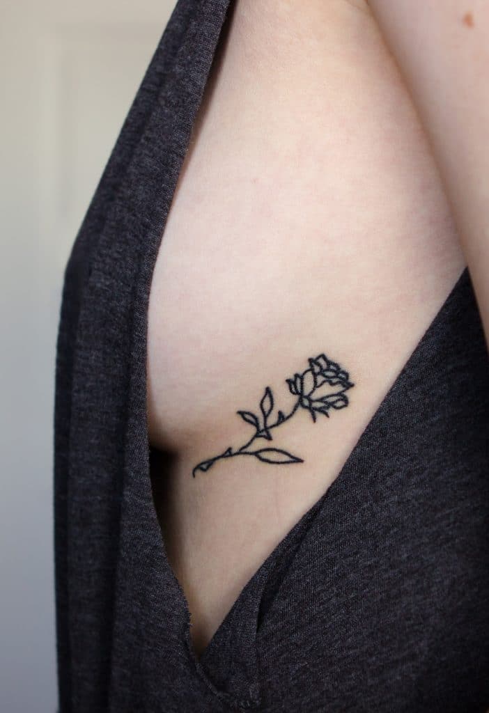 minimalist black outline rose tattoo