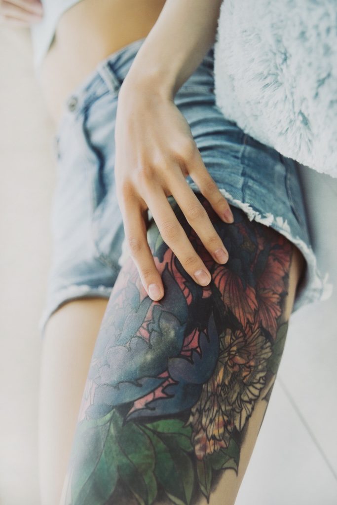 upper thigh tattoo 