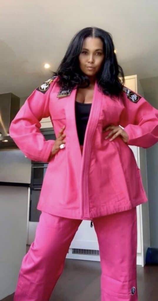 Woman wearing jiu jitsu Gi