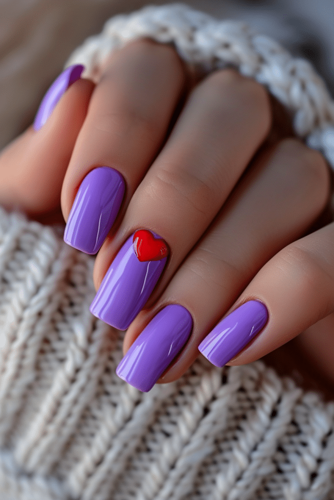 square purple nails with red heart feature nail, valentines nail design
