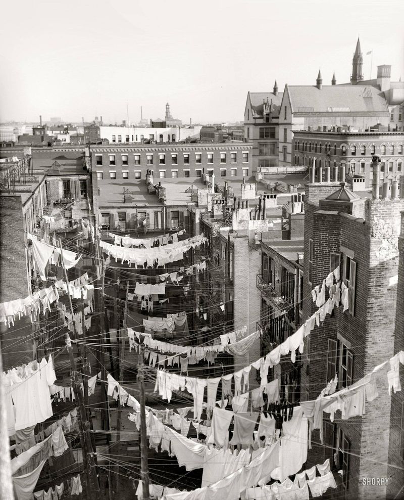 Women Hanging Laundry on Rooftops (1900s)