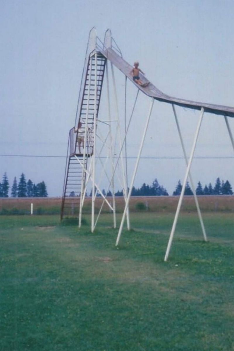 Playing on Scorching Metal Playground Equipment