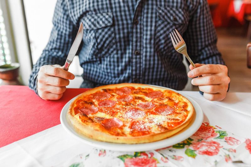 Eating Pizza with a Knife and Fork Is Wrong