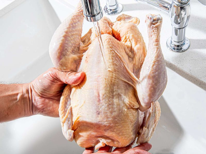 Washing Raw Chicken in the Sink