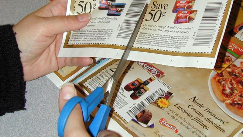 Clipping Paper Coupons from Newspapers