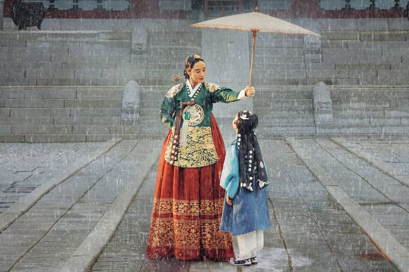Under the Queen's Umbrella
