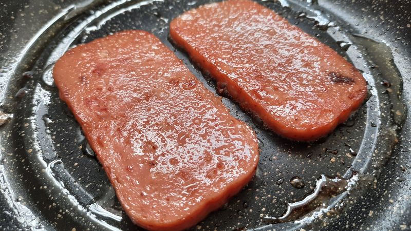 Pouring Extra Oil Into the Pan