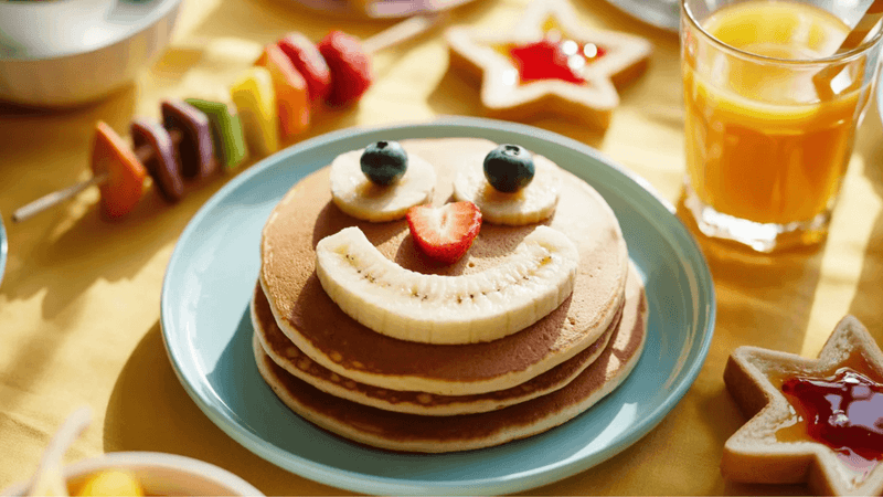 Mini Pancake Stacks with Fruit Faces