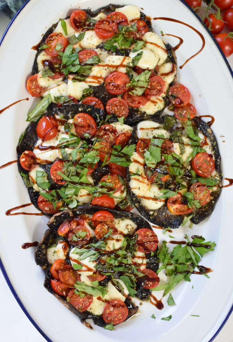 Caprese Stuffed Portobello Mushrooms with Pesto Drizzle