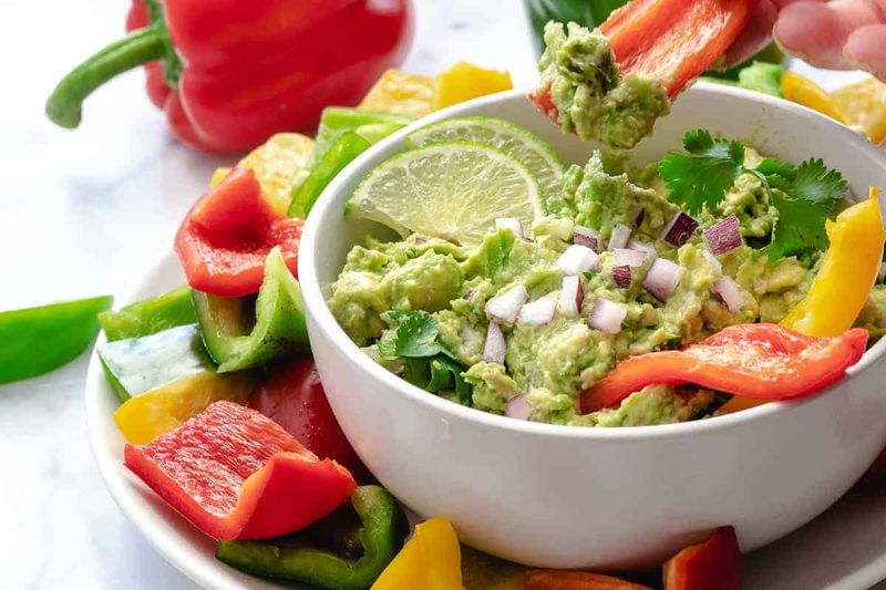 Sliced Bell Peppers With Guacamole Instead of Tortilla Chips and Dip