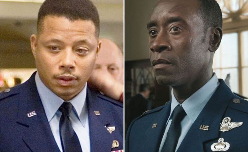 Terrence Howard and Don Cheadle as James Rhodes (War Machine)