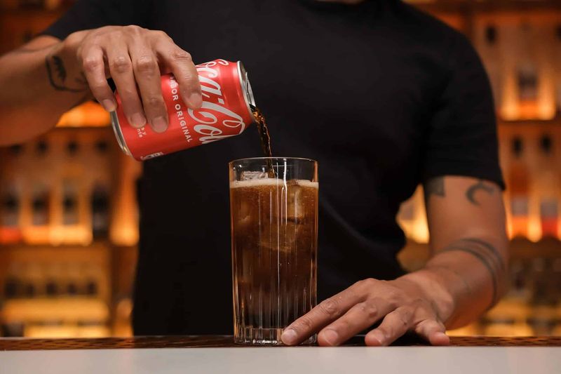 Whiskey (Neat or with Coca-Cola)
