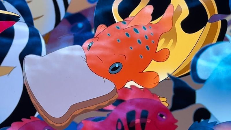 Lilo Feeding a Peanut Butter Sandwich to a Fish