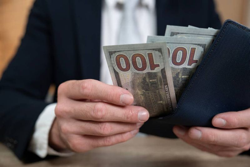Flashing Your Wallet to Impress Her