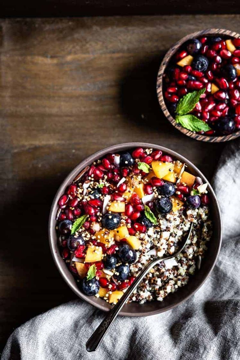 Quinoa Breakfast Bowls With Almonds and Pomegranate