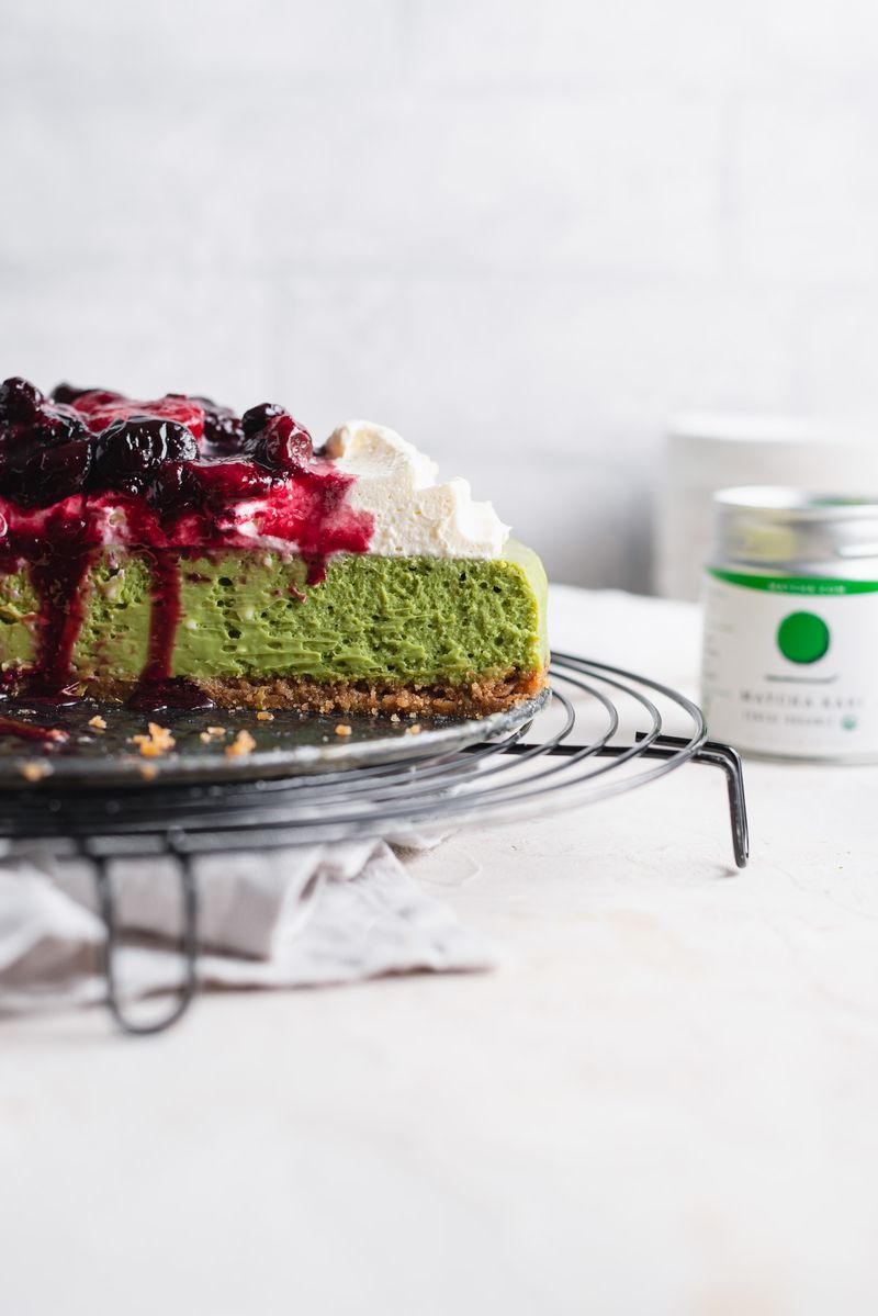 Matcha Green Tea Cheesecake with Raspberry Coulis