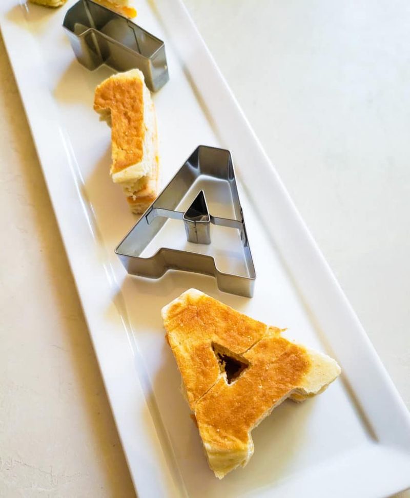 Use Alphabet Cookie Cutters to Shape Cheese Slices