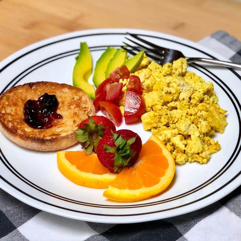 Tofu Scramble with Diced Tomatoes and Orange Slices