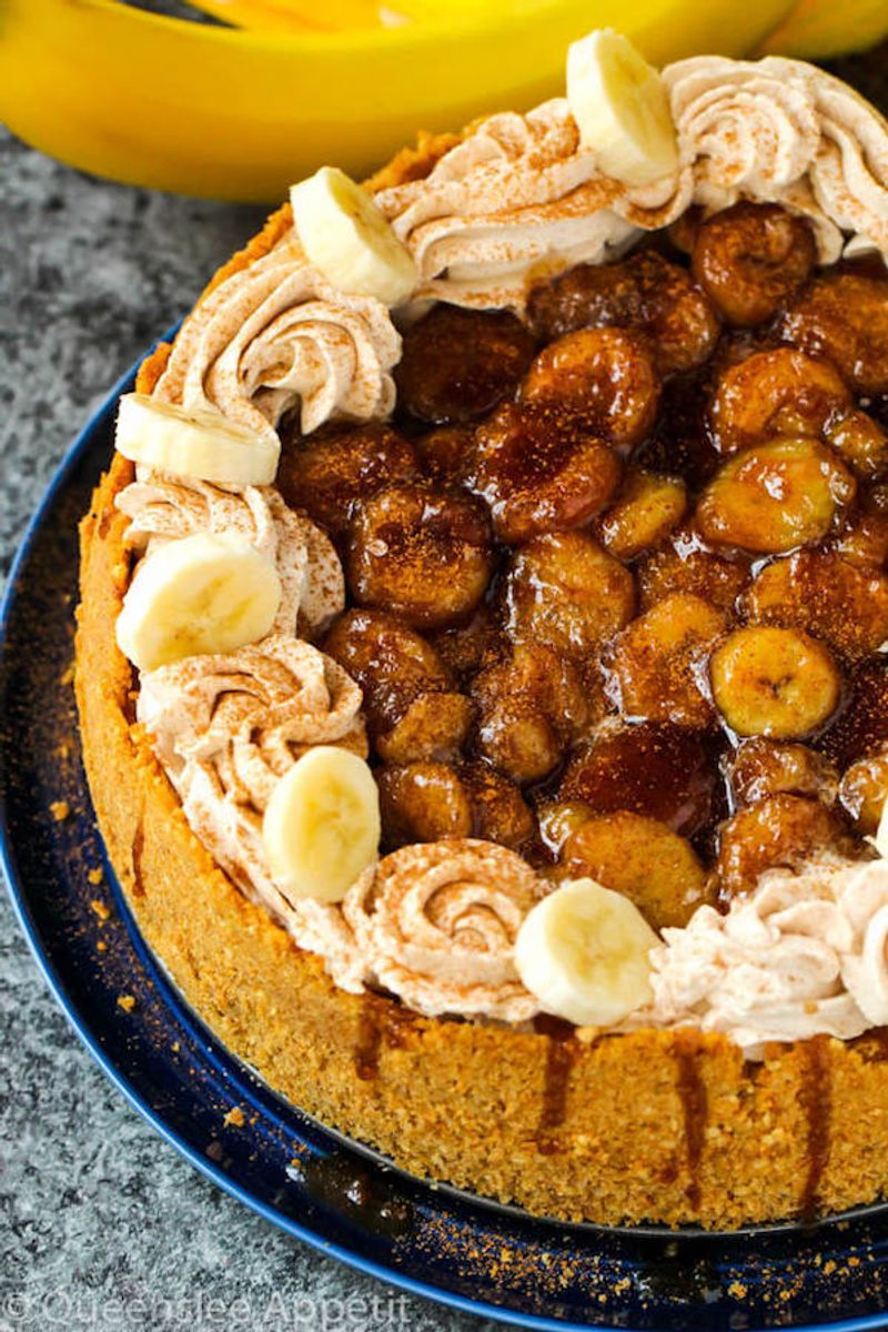 Banana Foster Cheesecake with Rum Caramel Sauce